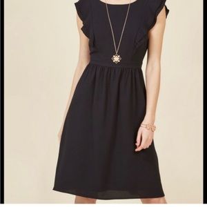 Fervour Large ruffle ModCloth black dress l tie back